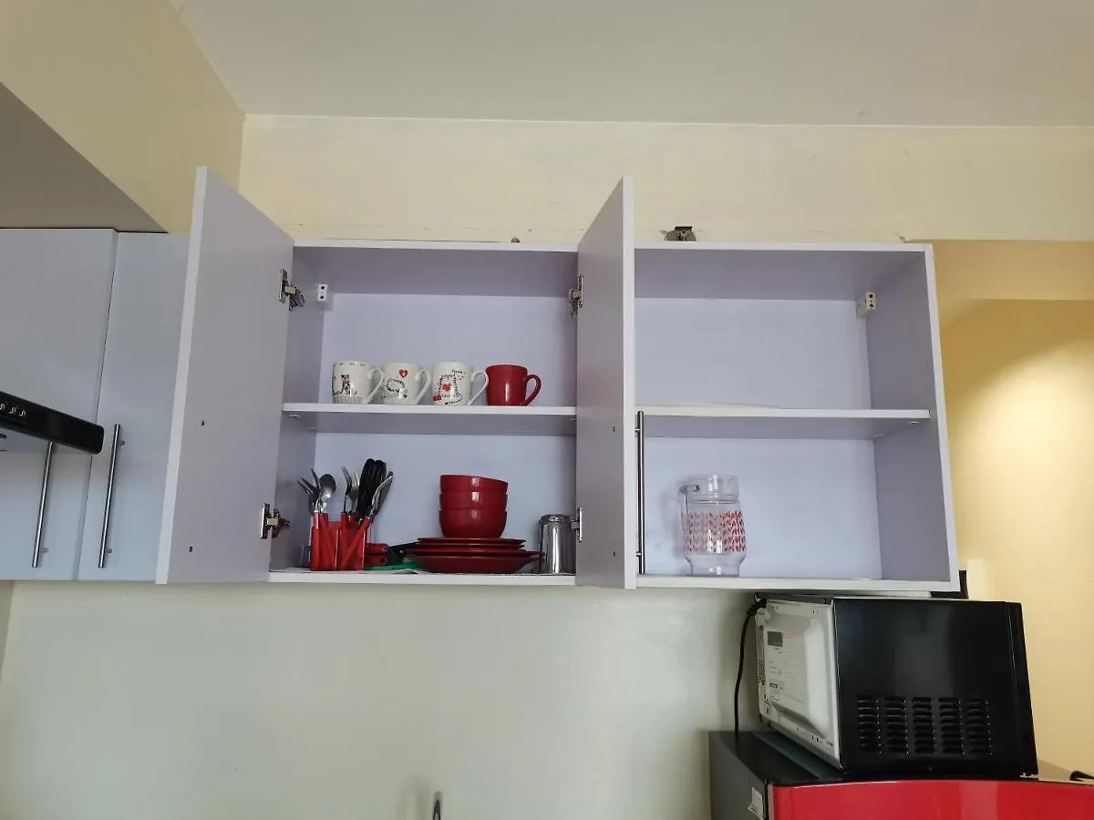 アパートホテル Avida Towers 1Br Sea And City View Condo At Poblacion ダバオ　シティ